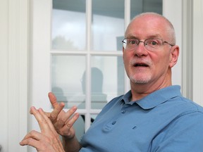 Paul Boothe, of the Trillium Network for Advanced Manufacturing rhymes off a number of successful manufacturers in the London area at his office in London, Ont. on Friday July 8, 2016. 
Mike Hensen/The London Free Press/Postmedia Network