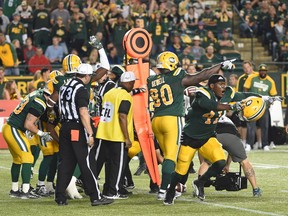 The Eskimos defence stops the Saskatchewan Roughriders on a third-and-one drive for a 39-36 CFL win in OT on July 8, 2016.