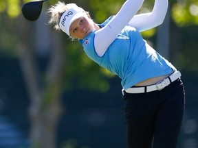 Brooke Henderson tees off on the ninth hole during the final round of the U.S. Women’s Open at CordeValle Golf Club in San Martin, Calif., yesterday. The Canadian finished 11-over par. (Getty Images)