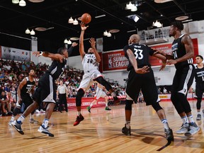Raptors’ Norman Powell shoots over the Timberwolves during Summer League action in Las Vegas last night. Powell led the Raptors with 29 points in the 82-80 win. (Getty Images)