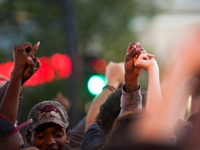 Protestors march through the streets of St. Paul, Minnesota after the death of Philando Castile on July 7, 2016. Castile was shot and killed by a police officer during a traffic stop on July 6, 2016 in Falcon Heights, MN. (Photo by Stephen Maturen/Getty Images)