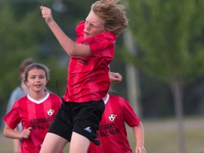 Spencer Boyce of the U13 Lockhart Funeral Home soccer team heads the ball during recent action against Thorndale, a 5-1 win. JEFF LOCKHART PHOTO