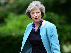 This file photo taken on June 27, 2016 shows British Home Secretary Theresa May walking to attend a cabinet meeting at 10 Downing St. in central London. (LEON NEALLEON NEAL/AFP/Getty Images)