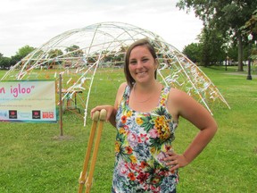 Shannon Lansue stands next to Not an Igloo on Monday July 11, 2016 at the waterfront park in Point Edward, Ont. The temporary interactive art display was created by Lansue and John DeGroot, with a grant from the Sarnia Chapter of the Awesome Foundation. (Paul Morden/Sarnia Observer/Postmedia Network)