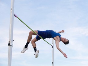 Derek Drouin makes his jump during the senior men's semifinal at the Canadian Track and Field Championships and Selection Trials for the 2016 Summer Olympic and Paralympic Games, in Edmonton, Alta., on Saturday, July 9, 2016. (THE CANADIAN PRESS/Jason Franson)