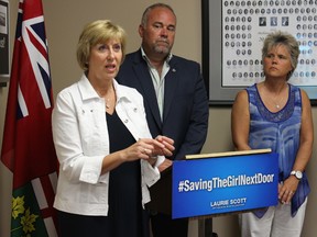 Samantha Reed/The Intelligencer
Laurie Scott, MPP for the Haliburton-Kawartha Lakes-Brock riding, speaks during a press conference Monday afternoon. Standing behind her is Prince Edward-Hastings MPP Todd Smith and Kim Charlebois, executive director of Sexual Assault Centre for Quinte and District. Scott is working to pass Bill 158, otherwise known as the 'Saving The Girl Next Door Act,' which works to stop the human trafficking of teenaged girls in Ontario.