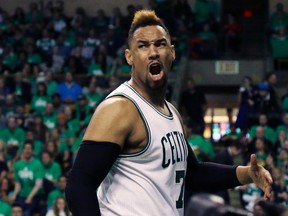 Boston Celtics centre Jared Sullinger yells after being fouled by Atlanta Hawks forward Kent Bazemore during the third quarter in Game 3 of a first-round NBA basketball playoff series Friday, April 22, 2016, in Boston. (AP Photo/Elise Amendola)
