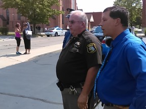 Berrien County Sheriff Paul Bailey confirms that two court bailiffs were shot and killed inside the Berrien County Courthouse in St. Joseph, Mich., before officers killed the gunman on Monday, July 11, 2016. (Tony Wittkowski/The Herald-Palladium via AP)