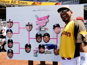 Blue Jays’ Edwin Encarnacion makes his pick, Robinson Cano, to win the home run derby in San Diego on July 11, 2016. (AP)