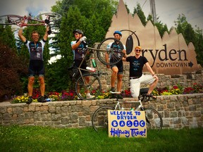 Members of BASIC celebrate reaching Dryden on their cross-country cycling tour. The group is expecting to be in Sudbury on Friday. (Photo supplied)