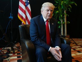 Republican Presidential candidate Donald Trump listens to a question during an interview after a rally in Virginia Beach, Va., Monday, July 11, 2016. (AP Photo/Steve Helber)