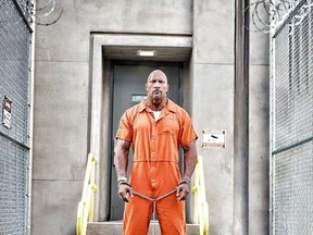 In a new set photo posted on Instagram, Dwayne Johnson’s Agent Hobbs is seen in jail in "Fast & Furious 8."