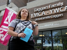 Childcare workers walk the picket line at the YMCA in Argyle Ave in Ottawa Tuesday July 12, 2016. Dozens of childcare workers at two YMCA locations and an east Ottawa public school are officially on strike after going one year without a contract, leaving more than 200 children without daycare. TONY CALDWELL