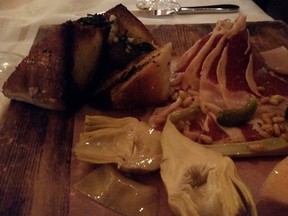 The thin-cut Spanish ham, presented charcuterie style, is delicious.