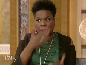 Leslie Jones reacts to her curse word while on Live! with Kelly. (YouTube screen shot)