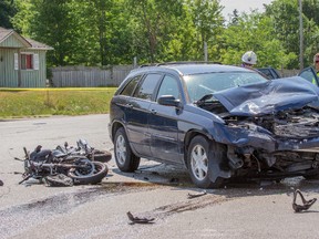 Collision between an SUV and a motorcycle, in the intersection of Yonge and Shoreacres Drive in Innisfil, Ont. on July 12, 2015. Paul Novosad/Photographer
