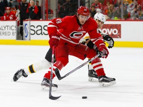 Carolina Hurricanes forward Victor Rask skates with the puck as Boston Bruins defencemen Zdeno Chara defends during the second period at PNC Arena in Raleigh on Feb. 26, 2016. (James Guillory/USA TODAY Sports)