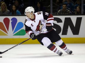 In this April 9, 2016, file photo, Arizona Coyotes captain Shane Doan skates with the puck during an NHL game against the San Jose Sharks in San Jose, Calif. (AP Photo/Marcio Jose Sanchez, File)