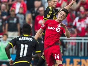 Toronto FC’s Jay Chapman leaps for a header against the Columbus Crew earlier this season. (THE CANADIAN PRESS)