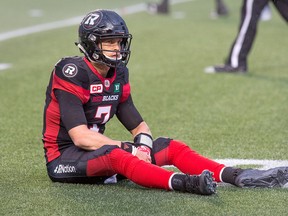 Redblacks QB Trevor Harris reacts to the interception he threw in the second quarter as the Ottawa Redblacks take on the Calgary Stampeders in CFL action at TD Place Stadium at Lansdowne Park in Ottawa on July 8, 2016. (Wayne Cuddington/Postmedia)