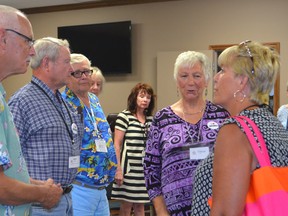 Communities in Bloom judge Sandy Cairns, right, greets the Southwold Communities in Bloom committee members Tuesday afternoon in council chambers before embarking on a whirlwind tour of the township. Cairns will be stopping by Southwold's most spectacular sites until Thursday.