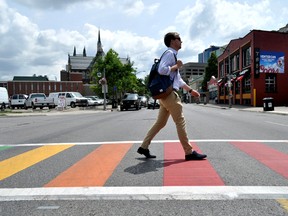 Chad Callander, vice president of Pride London, at the rainbow-coloured crosswalk on Richmond Street in downtown London Ont. July 7, 2016. CHRIS MONTANINI\LONDONER\POSTMEDIA NETWORK