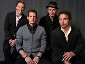 The Tenors, from left, Fraser Walters, Clifton Murray, Victor Micallef and Remigio Pereira pose for a photo in Los Angeles on Oct. 8, 2010. The Tenors changed some of the lyrics of O Canada as they made a political statement while singing the national anthem at Tuesday night's MLB all-star game. THE CANADIAN PRESS/AP, Damian Dovarganes