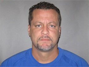 In this undated photo provided by the Michigan Department of Corrections, Larry Darnell Gordon is shown. Authorities say Gordon, an inmate who took a gun from a deputy and killed two bailiffs during an escape attempt at the Berrien County Courthouse in St. Joseph, Mich., July 11, 2016, was facing possible life in prison for rape and kidnapping charges involving a 17-year-old girl. (Michigan Department of Corrections via AP)