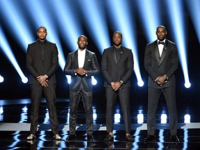 NBA players Carmelo Anthony, Chris Paul, Dwyane Wade and LeBron James speak onstage during the 2016 ESPYS at Microsoft Theater in Los Angeles on July 13, 2016. (Kevin Winter/Getty Images)