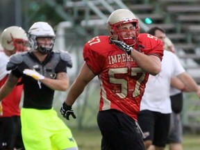 Adam Hart and his Sarnia Imperials teammates go through the paces during practice at Norm Perry Park on Wednesday, July 13, 2016 in Sarnia, Ont. The Imperials head to Brampton on Saturday to face the GTA All-Stars. Terry Bridge/Sarnia Observer/Postmedia Network