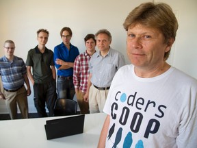 Tom Germain, right, is forming a coder's co-op in London's Hacker Studios, with him are Braden Campbell, Sebastian Rydzewski, Elias Puurunen, Tadhg Creedon and Dimitri Denissov in London, Ont. on Wednesday July 13, 2016. Mike Hensen/The London Free Press/Postmedia Network