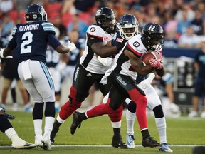 Ottawa Redblacks' Nic Grigsby runs for a touchdown against the Toronto Argonauts on July 13. (Mark Blinch, The Canadian Press)