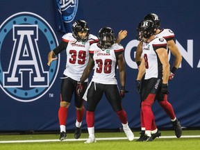 The Redblacks celebrate a touchdown at BMO Field on July 13. (The Canadian Press)