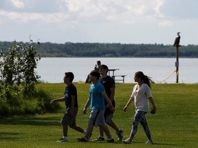 Visitors are seen as Astotin Lake Day Use area in Elk Island National Park, on Wednesday, July 13, 2016. The area will be upgraded as part of a $24 million increase in funding to national parks. Ian Kucerak / Postmedia