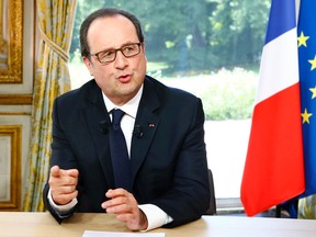 French President Francois Hollande gestures after a televised interview following the Bastille Day Parade in Paris, Thursday, July 14, 2016, at the Elysee Palace. (AP Photo/Francois Mori, Pool)
