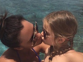 Beckham slammed for kissing daughter on lips. (Instagram/Victoria Beckham)