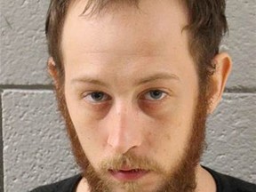 This undated photo provided by the Cumberland County Prison in Carlisle, Pa., shows Joshua Lee Long. Pennsylvania State Police charged Long on Thursday, July 14, 2016, with abuse of a corpse and conspiracy, accusing Long of spraying fluid used to embalm a human brain on marijuana before smoking it. (Cumberland County Prison via AP)