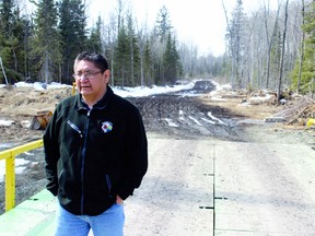 Shoal Lake #40 Chief Erwin Redsky at the location where a permanent bridge will be built to connect the community to Freedom Road and the the TransCanada Highway.