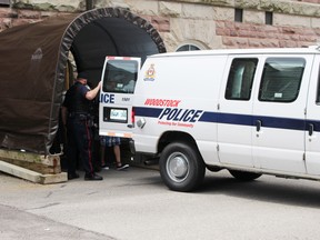 Flavius Miron, a 24-year-old accused of manslaughter in the death of Woodstock man Jerry Klassen, is loaded into a police van outside the Woodstock Courthouse on July 15, 2016.  (Sentinel-Review file photo)