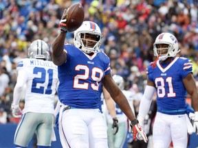 Buffalo Bills running back Karlos Williams (29) celebrates after scoring a touchdown against the Dallas Cowboys Sunday, Dec. 27, 2015, in Orchard Park, N.Y. (AP Photo/Gary Wiepert)