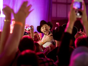 Brett Kissel takes selfies with the crowd during his concert at the TransAlta Tri-Leisure Centre in Spruce Grove on July 9, 2016. - Photo by Yasmin Mayne