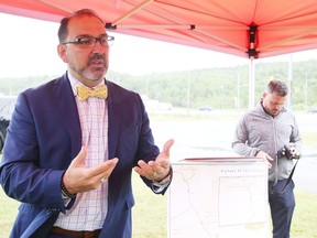 Sudbury MPP Glenn Thibeault tells media Friday that programs are available to help Northerners with high hydro bills. (Gino Donato/Sudbury Star)