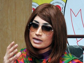 In this picture taken on June 28, 2016, Pakistani fashion model Qandeel Baloch speaks during a press conference in Lahore, Pakistan. Baloch, who recently stirred controversy by posting pictures of herself with a Muslim cleric on social media, was strangled to death by her brother, police said Saturday, July 16, 2016. (AP Photo/M. Jameel)