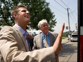 Then-Mayor David Miller and then-TTC chair Adam Giambrone at a press conference in 2010 complimenting a TTC streetcar driver that arrived on time. Stan Behal/Toronto Sun