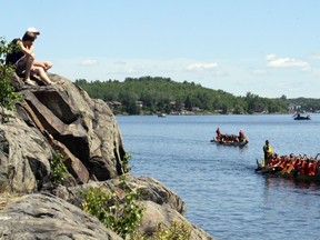 Spectators watch the action from the shore at Bell Park during the Sudbury Dragon Boat Festival on Saturday, July 16, 2016. Ben Leeson/The Sudbury Star/Postmedia Network