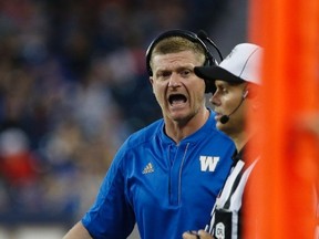 Winnipeg Blue Bombers head coach Mike O'Shea disputes a call during the second half of CFL action against the Edmonton Eskimos in Winnipeg Thursday, July 14, 2016. THE CANADIAN PRESS/John Woods