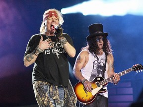 Axl Rose and Slash as Guns N' Roses perform at Soldier Field during the Not In This Lifetime Tour July 3, 2016. (Ray Garbo/WENN.com)