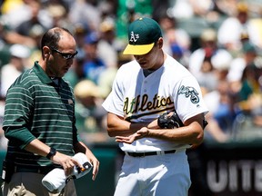 Athletics starter Rich Hill only threw five pitches before leaving the game with a burst blister yesterday. (GETTY IMAGES)