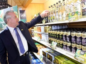 Minister responsible for SLGA Don McMorris looks over Saskatchewan product at the South Albert Liquor store in Regina in 2015. DON HEALY / REGINA LEADER-POST