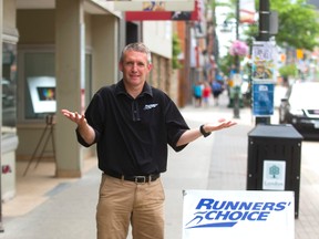 Brian Hagemeier, the owner of Runner's Choice on Dundas, came into work Saturday morning just after 8am to find his sandwich board sign leaning on his front door. Hagemeier said, "I thought the city had returned it, but apparently it wasn't the city. I'm happy to get the sign back obviously, but at this point I don't know if I should leave it out or not." (MIKE HENSEN, The London Free Press)